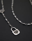 Collana stile rosario in acciaio - Cuore e lucchetto