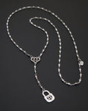 Collana stile rosario in acciaio - Cuore e lucchetto