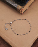 Bracciale base in acciaio e perline nere- Fiore gotico