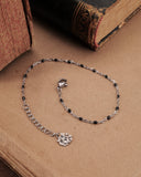 Bracciale base in acciaio e perline nere- Fiore gotico