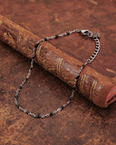 Bracciale base in acciaio e perline nere- Fiore gotico