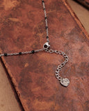 Collana base in acciaio con perline nere - Cuore