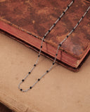 Collana base in acciaio con perline nere - Fiore gotico