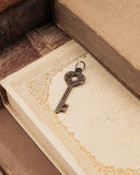 Charm chiave mini - Bronzo oro antico