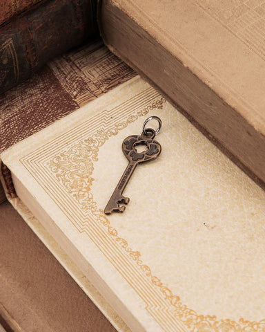 Charm chiave mini - Bronzo oro antico
