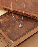 Collana girocollo in acciaio con micro pendente Cuore