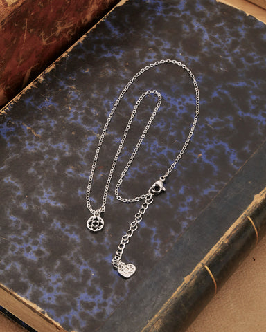 Collana girocollo in acciaio con micro pendente Rosone