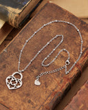 Collana corta con sfere in acciaio - Lucchetto cuore traforato