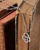 Collana corta con sfere in acciaio - Lucchetto cuore traforato