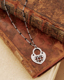 Collana corta con sfere nere in acciaio - Lucchetto cuore