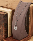 Collana corta con sfere nere in acciaio - Lucchetto