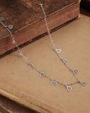 Collana girocollo 12 mini pendenti in acciaio - Cuore