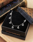 Collana girocollo 12 mini pendenti in acciaio - Cuore