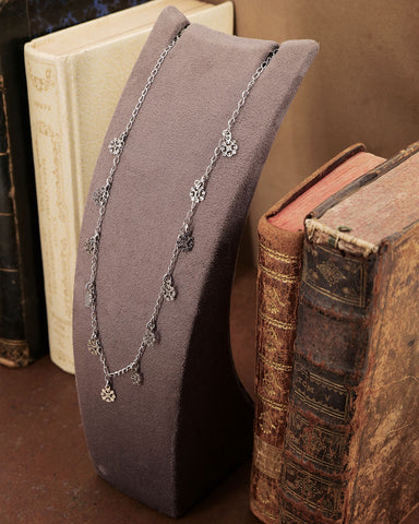 Collana girocollo 12 mini pendenti in acciaio - Fiore gotico