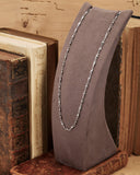 Collana base in acciaio stile rosario con chiusura fiore