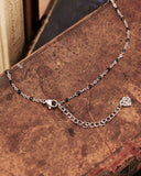 Collana base in acciaio con black beads - chiusura cuore