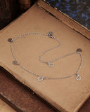 Collana girocollo in acciaio con 6 mini pendenti Cuore