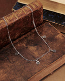 Collana girocollo in acciaio con 6 mini pendenti  Fiore gotico