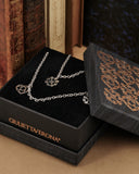 Collana lunga 8 pendenti in acciaio - Cuore e Fiore gotico