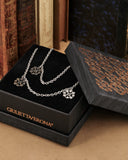 Collana lunga 8 pendenti in acciaio - Fiore gotico