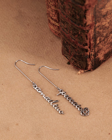 Orecchini pendenti in acciaio - Ama il tuo peccato