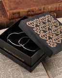 Orecchini cerchio "cuore" in acciaio - Chiave cuore