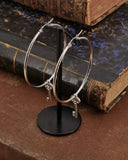 Orecchini cerchio in acciaio - Chiave cuore