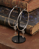 Orecchini cerchio in acciaio - Chiave fiore gotico