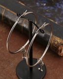 Orecchini cerchio in acciaio - Chiave fiore gotico