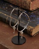 Orecchini cerchio "cuore" in acciaio - Chiave cuore