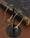 Orecchini cerchio "cuore" in acciaio - Chiave cuore