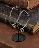 Orecchini cerchio "cuore" in acciaio - Cuore