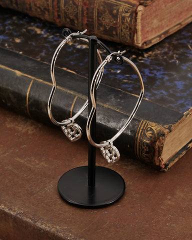 Orecchini cerchio "cuore" in acciaio - Cuore