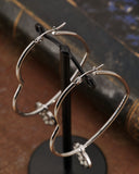 Orecchini cerchio "cuore" in acciaio - Cuore