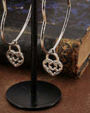 Orecchini cerchio "cuore" in acciaio - Lucchetto cuore traforato