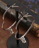 Orecchini cerchio "cuore" in acciaio - Lucchetto cuore traforato