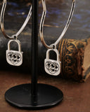 Orecchini cerchio "cuore" in acciaio - Lucchetto