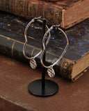 Orecchini cerchio "cuore" in acciaio - Rosone