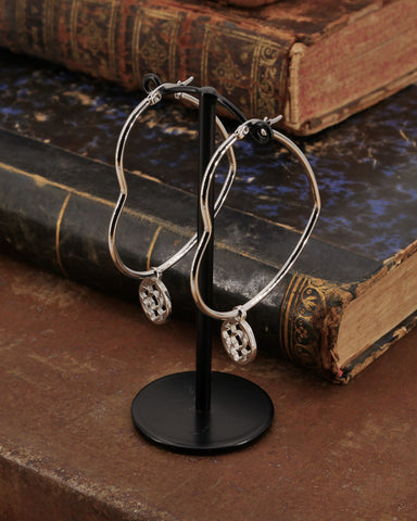 Orecchini cerchio "cuore" in acciaio - Rosone