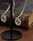 Orecchini cerchio "cuore" in acciaio - Rosone