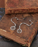 Orecchini pendenti in acciaio - Rosone