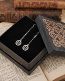 Orecchini pendenti in acciaio - Rosone