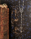 Collana stile rosario in acciaio - Lucchetto cuore traforato e Chiave cuore