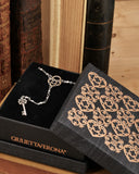 Collana stile rosario in acciaio - Lucchetto cuore traforato e Chiave fiore gotico