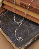 Collana stile rosario in acciaio - Cuore e lucchetto cuore traforato