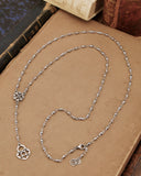 Collana stile rosario in acciaio - Fiore gotico e lucchetto cuore traforato