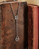 Collana stile rosario in acciaio - Fiore gotico e lucchetto cuore traforato