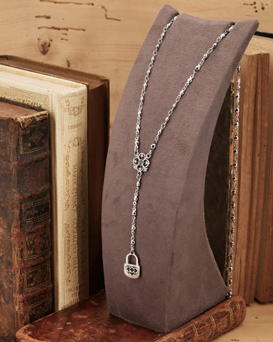 Collana stile rosario in acciaio - Fiore gotico e lucchetto