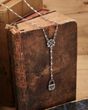 Collana stile rosario in acciaio - Fiore gotico e lucchetto