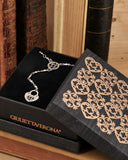 Collana stile rosario in acciaio - Rosone e lucchetto cuore